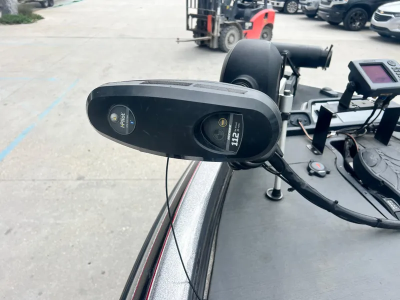 Slide: The Image of Close-up of a 2009 Ranger 208 VX boat's trolling motor on a trailer. - 12