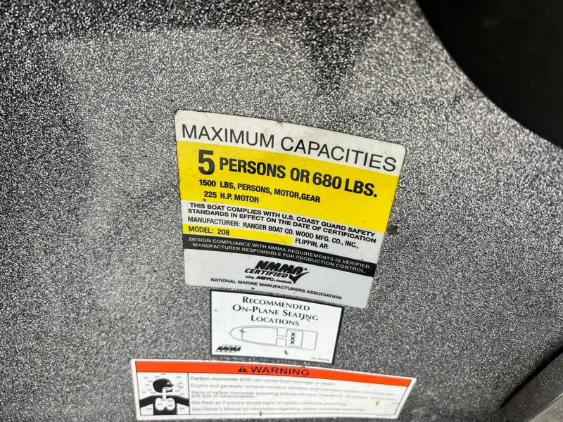 Slide: The Image of Maximum capacity label on 2009 Ranger 208 VX boat, 5 persons or 680 lbs. - 19