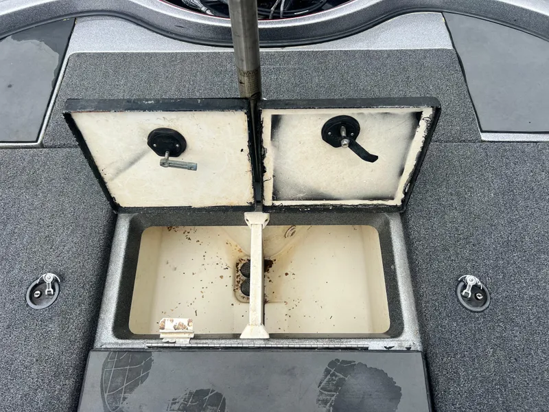 Slide: The Image of Open storage compartment on 2009 Ranger 208 VX boat deck. - 24
