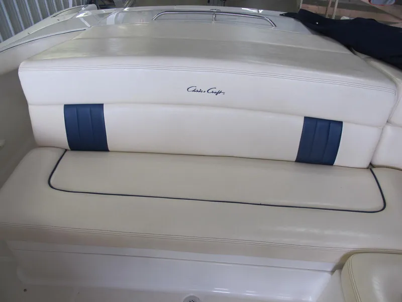 Slide: The Image of 2003 Chris-Craft Launch 28 boat seat with white and blue upholstery. - 13