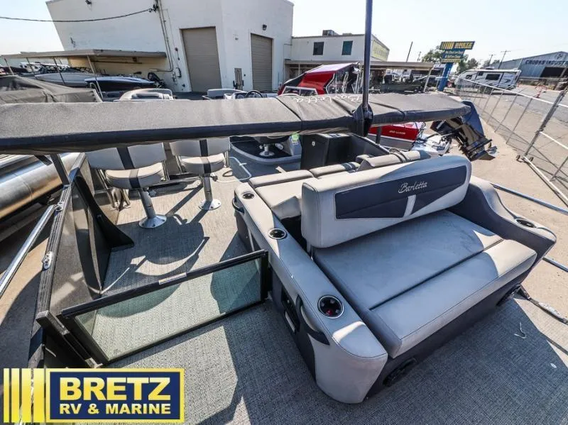 Slide: The Image of 2024 Cabrio Ultra-Entertainer C24UE boat interior at Bretz RV & Marine dealership. - 10