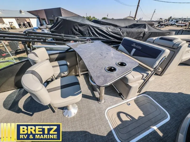 Slide: The Image of 2024 Cabrio Ultra-Entertainer C24UE boat interior with seating and table, Bretz RV & Marine. - 13