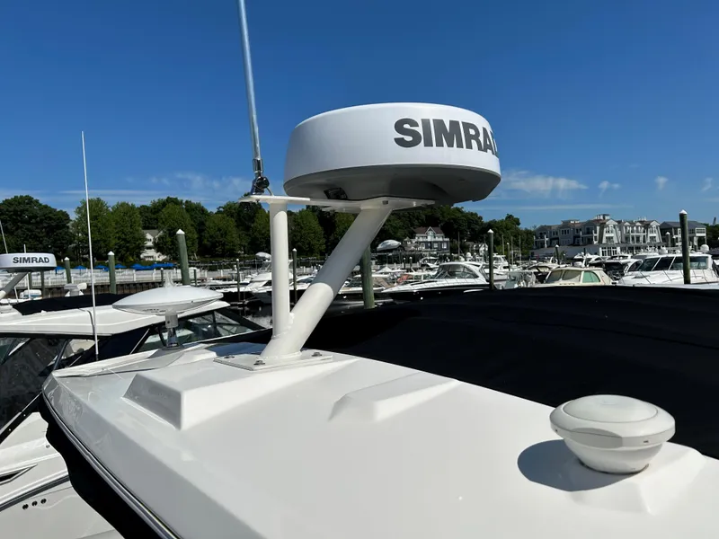 Slide: The Image of Sea Ray 320 DA 2021 boat with Simrad radar at marina. - 10