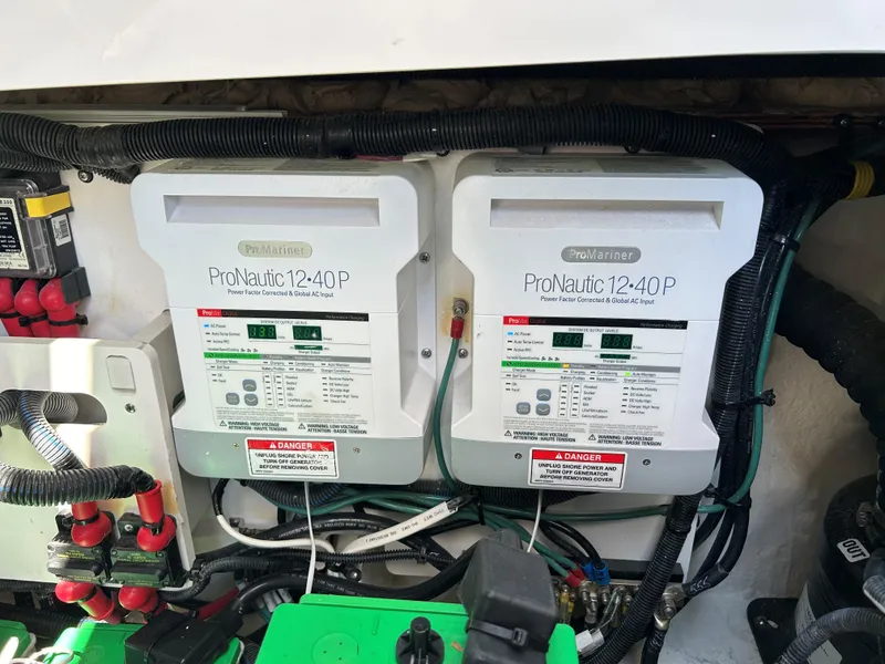 Slide: The Image of ProNautic 1240P battery chargers in a 2021 Sea Ray 320 DA boat. - 24
