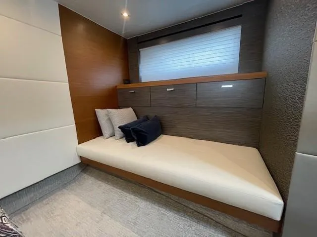 Slide: The Image of 2019 Tiara Yachts C53 Coupe interior cabin with modern design and comfortable seating. - 24