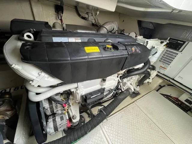 Slide: The Image of Engine room of a 2019 Tiara Yachts C53 Coupe. - 33