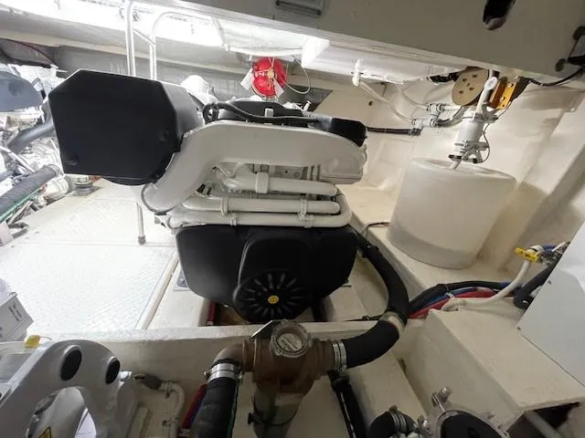 Slide: The Image of Engine room of a 2019 Tiara Yachts C53 Coupe. - 34