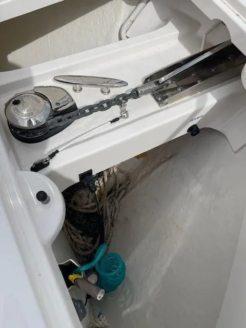 Slide: The Image of Anchor locker of 2019 Tiara Yachts C53 Coupe with windlass and chain. - 6