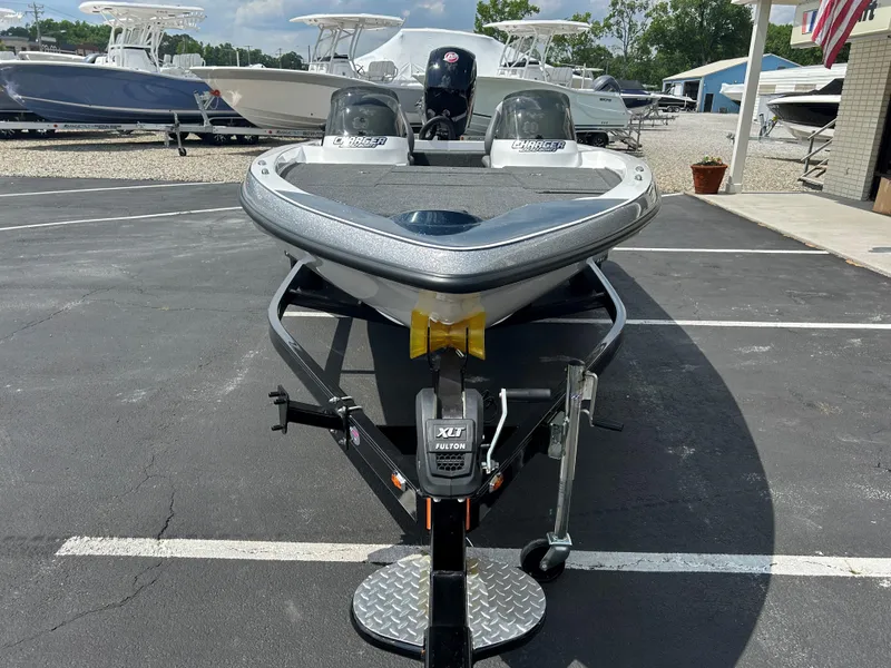 Slide: The Image of 2022 Charger Bass Boat 176 on trailer in parking lot. - 2