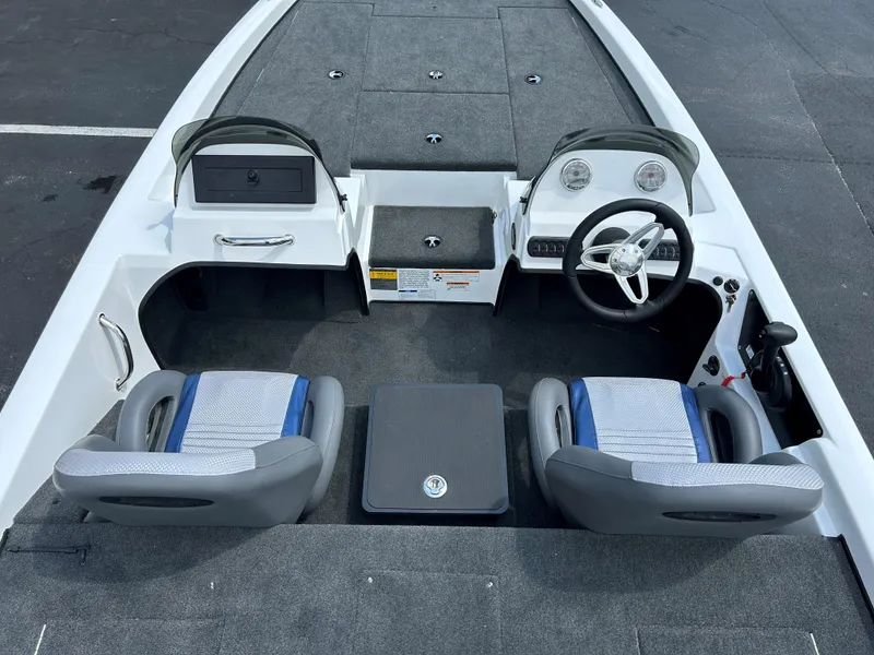 Slide: The Image of 2022 Charger Bass Boat 176 interior with dual seats and steering console. - 8