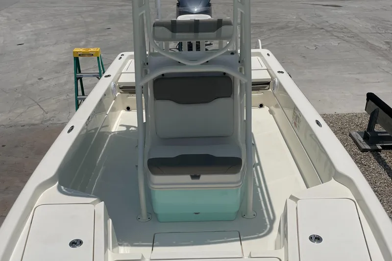 Slide: The Image of 2016 Skeeter SX 240 boat interior with seating and storage compartments. - 1