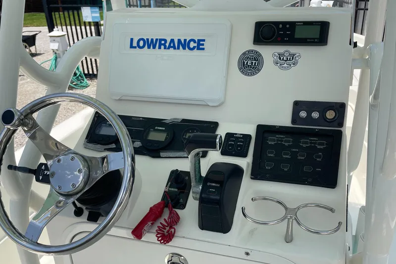 Slide: The Image of 2016 Skeeter SX 240 boat console with Lowrance electronics and Yamaha controls. - 10