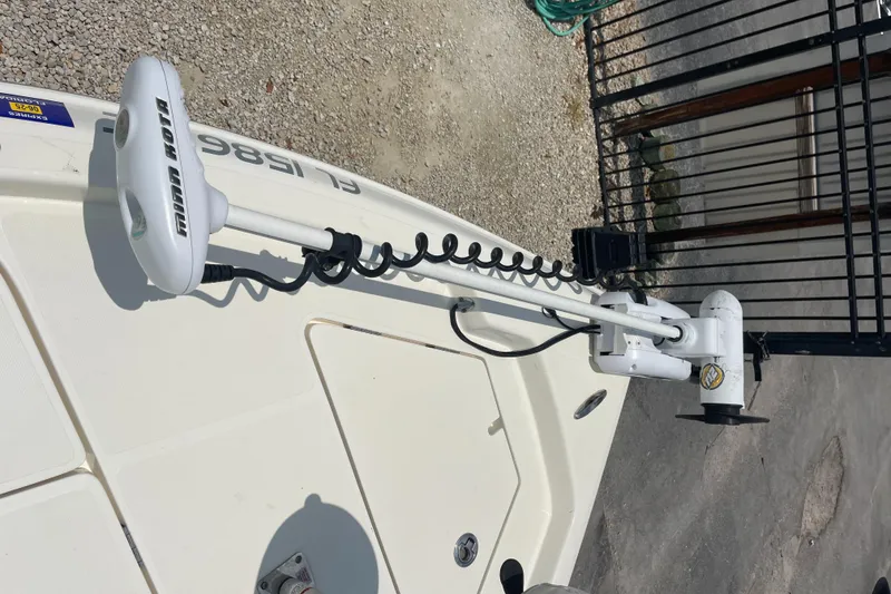 Slide: The Image of 2016 Skeeter SX 240 boat with trolling motor on deck. - 17