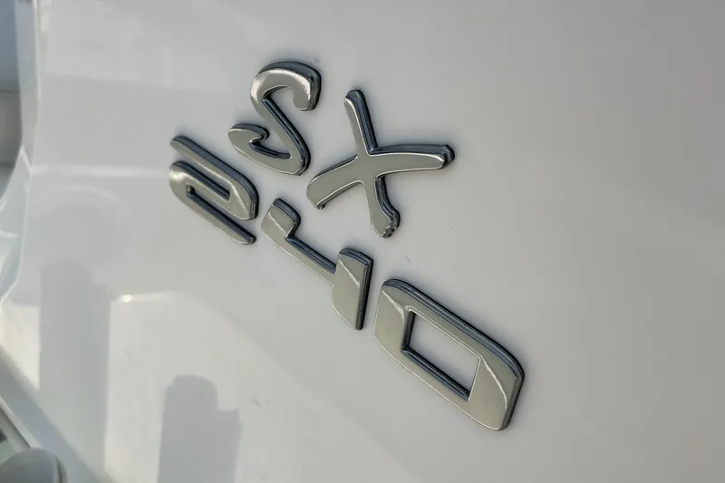 Slide: The Image of 2016 Skeeter SX 240 boat model emblem on white surface - 21