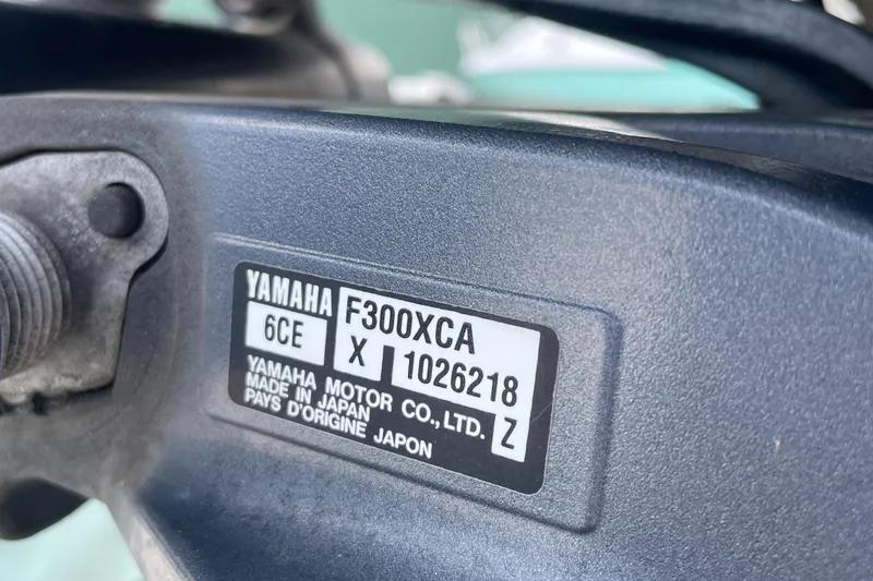 Slide: The Image of Yamaha F300XCA engine label on a 2016 Skeeter SX 240 boat. - 22