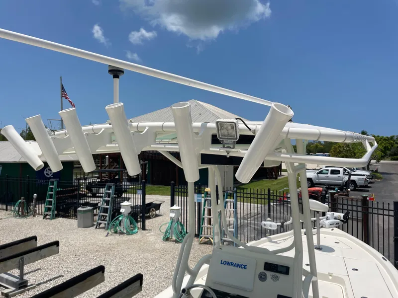 Slide: The Image of 2016 Skeeter SX 240 boat with rod holders and Lowrance electronics. - 3