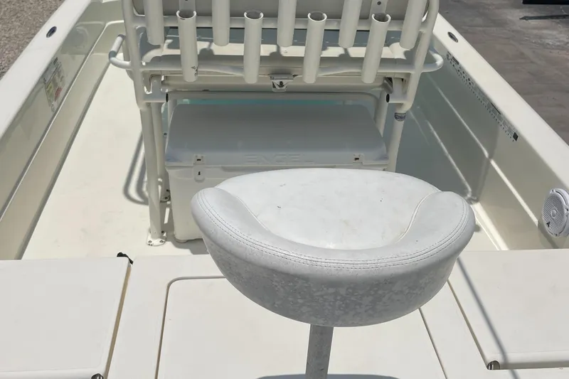 Slide: The Image of 2016 Skeeter SX 240 boat interior with seating and rod holders. - 9