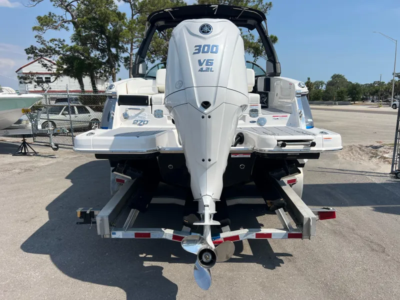 Slide: The Image of 2024 Chaparral 270 OSX boat with Yamaha 300 V6 engine on trailer. - 3