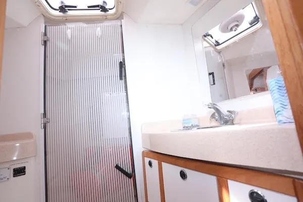 Slide: The Image of Bathroom interior of 2002 Catalina 42 MK 2 sailboat with shower and sink. - 25