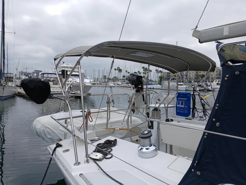 Slide: The Image of 2002 Catalina 42 MK 2 sailboat docked at a marina. - 3