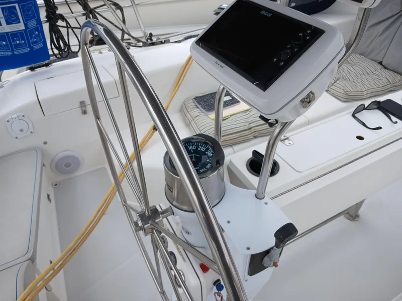 Slide: The Image of Steering wheel and navigation equipment on a 2002 Catalina 42 MK 2 sailboat. - 5