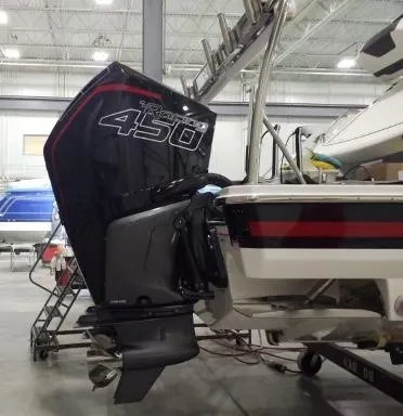 Slide: The Image of 2021 Formula 430 Super Sport Crossover boat with powerful outboard motor in a marina. - 16