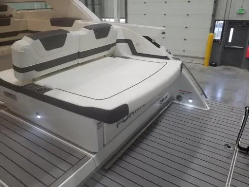 Slide: The Image of 2021 Formula 430 Super Sport Crossover boat interior with cushioned seating. - 6