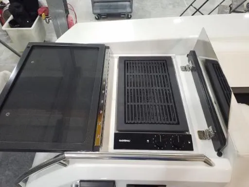 Slide: The Image of Outdoor grill station on 2021 Formula 430 Super Sport Crossover boat. - 9