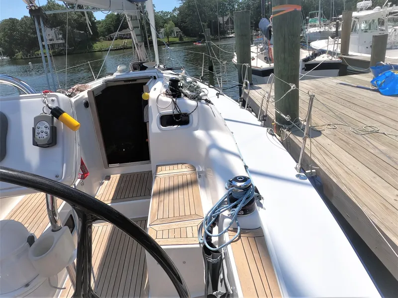 Slide: The Image of Cockpit view of 2010 Finn Flyer 33 R sailboat docked at marina. - 12
