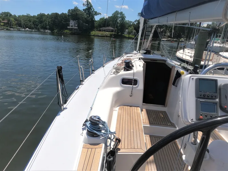 Slide: The Image of Cockpit view of 2010 Finn Flyer 33 R sailboat docked on a sunny day. - 14