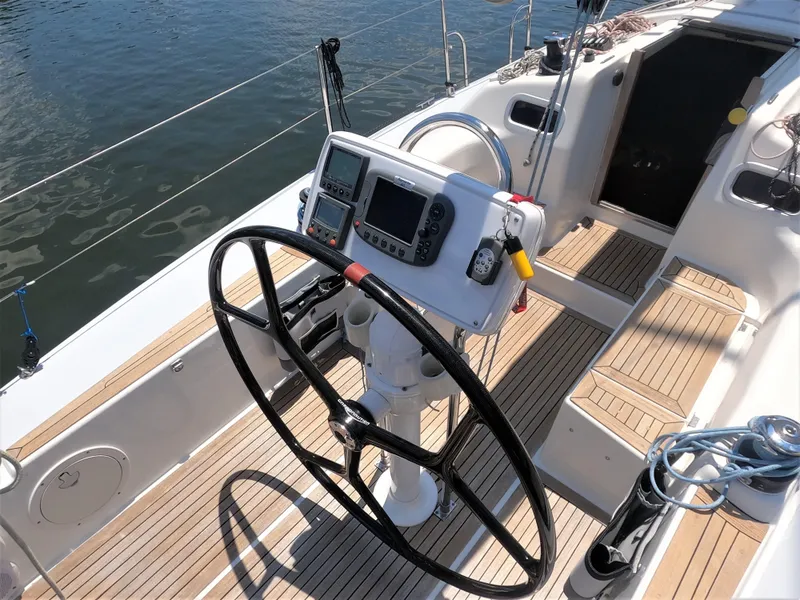 Slide: The Image of Cockpit of a 2010 Finn Flyer 33 R sailboat with navigation instruments. - 16