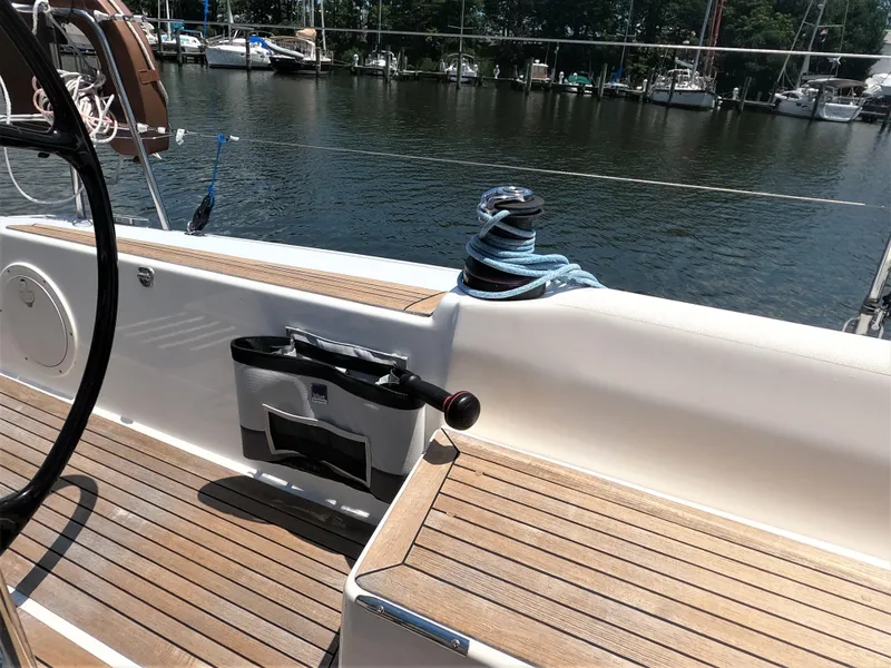 Slide: The Image of Cockpit of 2010 Finn Flyer 33 R sailboat with teak decking and marina view. - 18