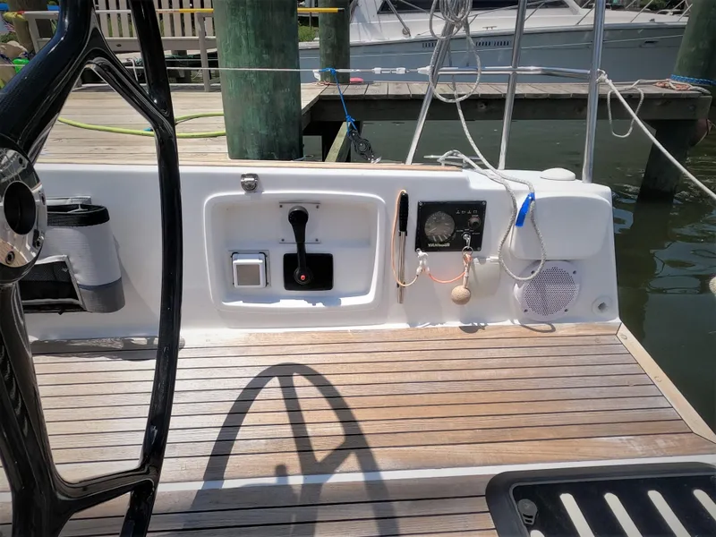 Slide: The Image of Cockpit controls of a 2010 Finn Flyer 33 R sailboat at a marina. - 19