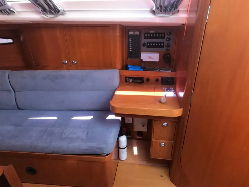 Slide: The Image of Interior of a 2010 Finn Flyer 33 R sailboat with seating and navigation station. - 26