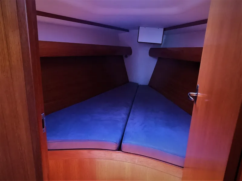 Slide: The Image of 2010 Finn Flyer 33 R sailboat interior cabin with blue cushions - 30