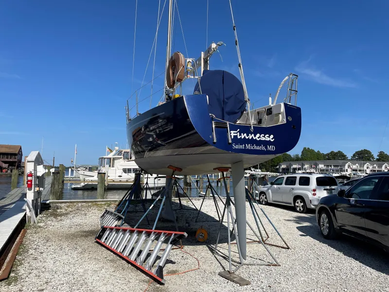 Slide: The Image of 2010 Finn Flyer 33 R sailboat Finesse on stands at marina, Saint Michaels, MD. - 40