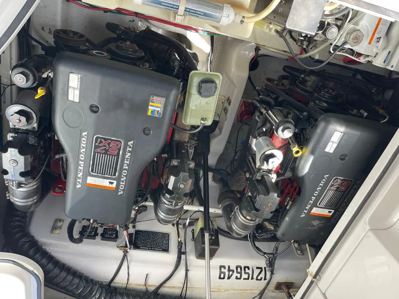 Slide: The Image of 2008 Four Winns V338 engine compartment with dual Volvo Penta engines. - 43