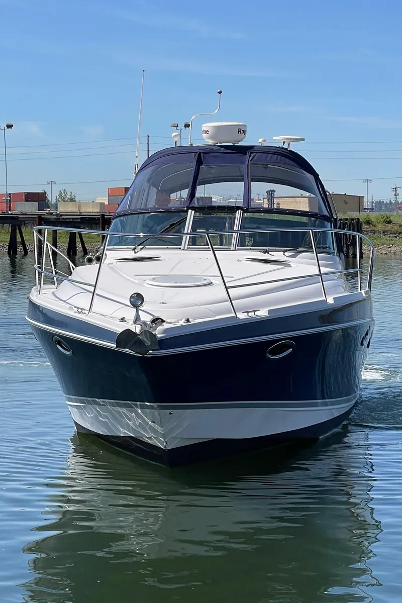 Slide: The Image of 2008 Four Winns V338 boat on water. - 47