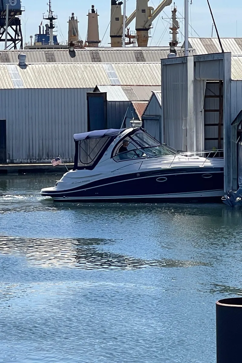 Slide: The Image of 2008 Four Winns V338 boat docked in a marina. - 48