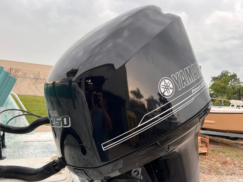 Slide: The Image of Close-up of a Yamaha 150 outboard motor on a 1978 Excalibur 32 boat. - 10