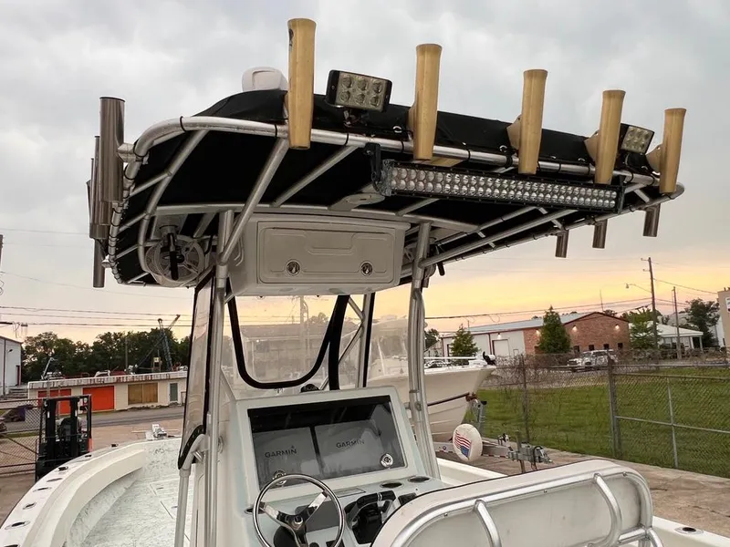 Slide: The Image of 1978 Excalibur 32 boat with fishing rod holders and navigation equipment. - 22