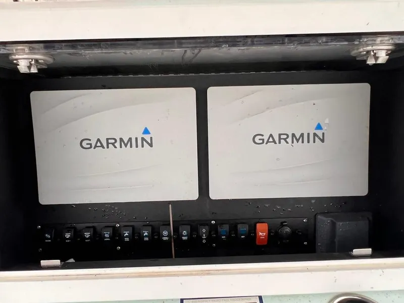 Slide: The Image of Garmin navigation system on a 1978 Excalibur 32 boat. - 23