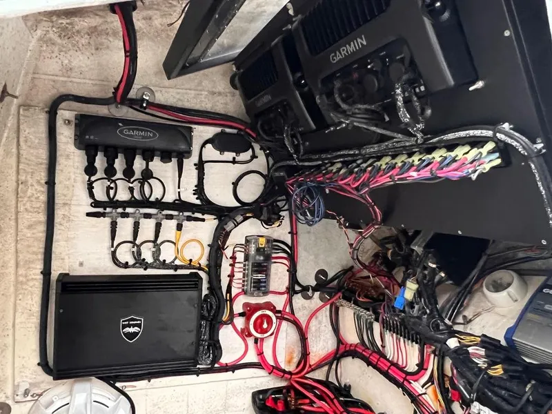 Slide: The Image of 1978 Excalibur 32 boat electrical system with Garmin equipment and wiring. - 24