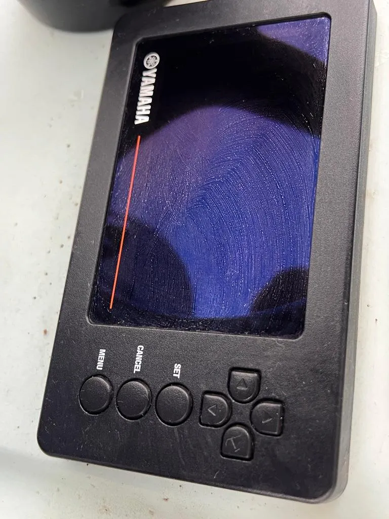 Slide: The Image of Yamaha electronic device with buttons and screen, Excalibur 32, 1978 model. - 28