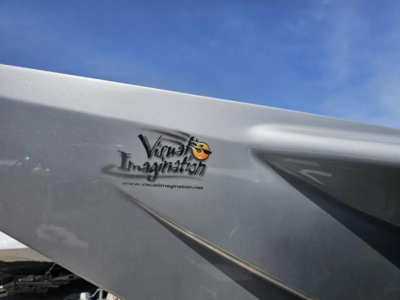 Slide: The Image of 2007 MTI 44 AMG TRIBUTE boat with Visual Imagination logo on silver hull. - 11