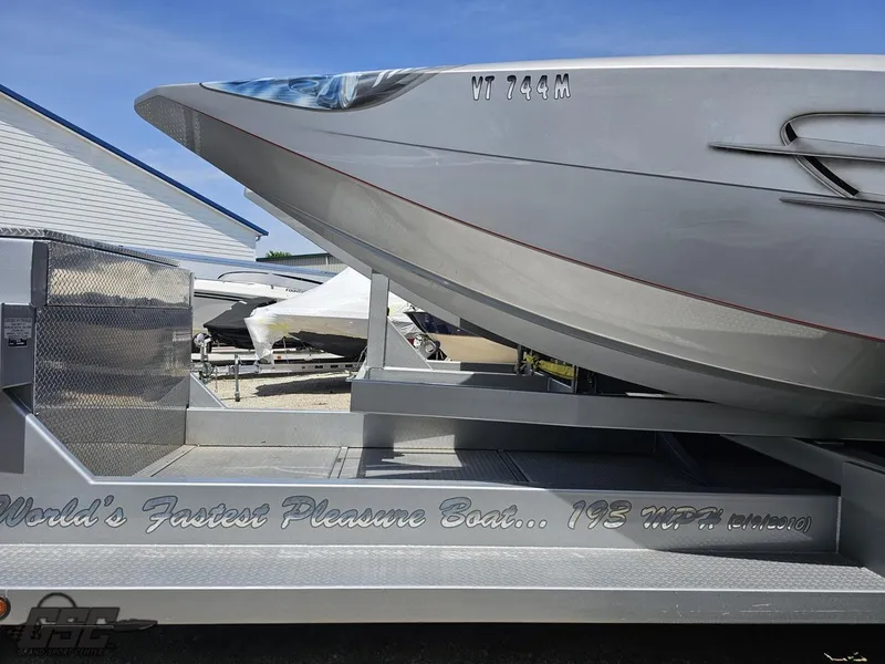 Slide: The Image of 2007 MTI 44 AMG TRIBUTE boat on trailer, labeled World's Fastest Pleasure Boat... 193 MPH. - 12