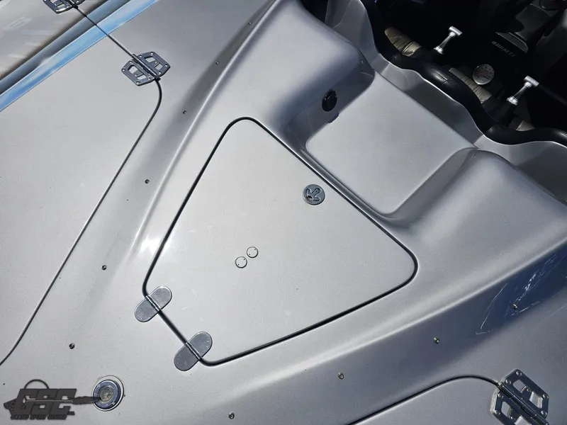 Slide: The Image of Close-up of 2007 MTI 44 AMG TRIBUTE boat deck with storage compartment. - 23