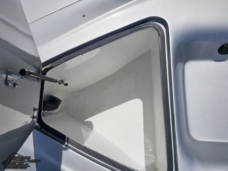 Slide: The Image of Open storage compartment on a 2007 MTI 44 AMG TRIBUTE boat. - 24