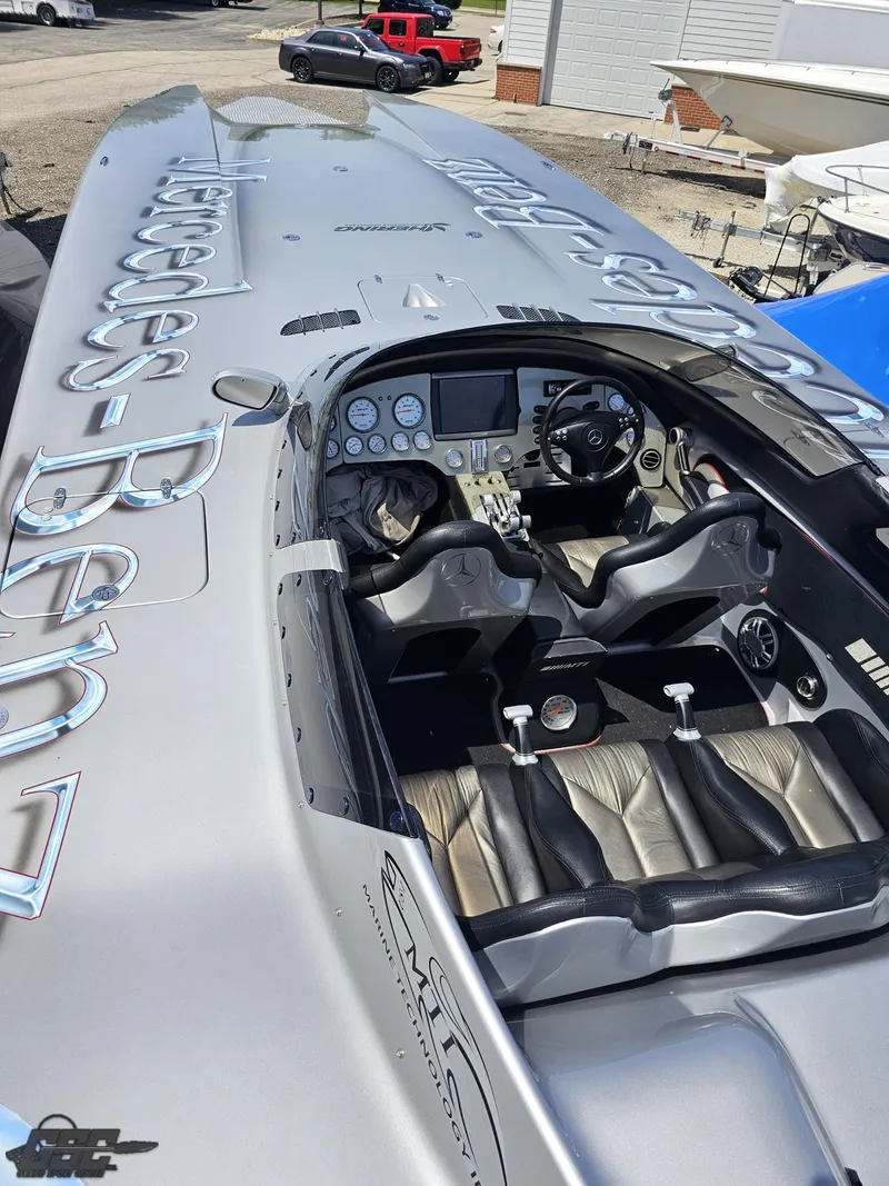 Slide: The Image of 2007 MTI 44 AMG TRIBUTE speedboat cockpit with Mercedes-Benz branding. - 26