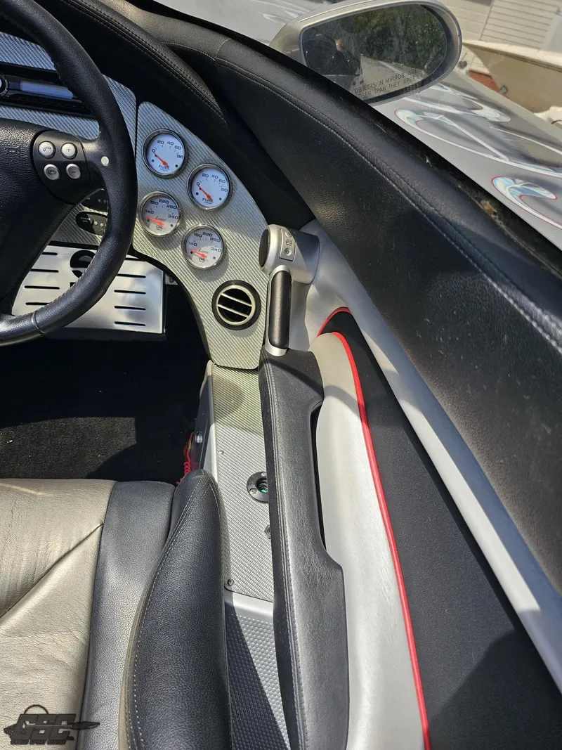 Slide: The Image of Interior of 2007 MTI 44 AMG TRIBUTE with gauges and steering wheel. - 38
